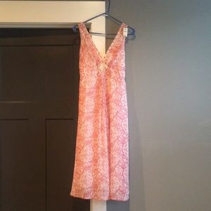 Pink, cream and tan dress cream slip underneath.